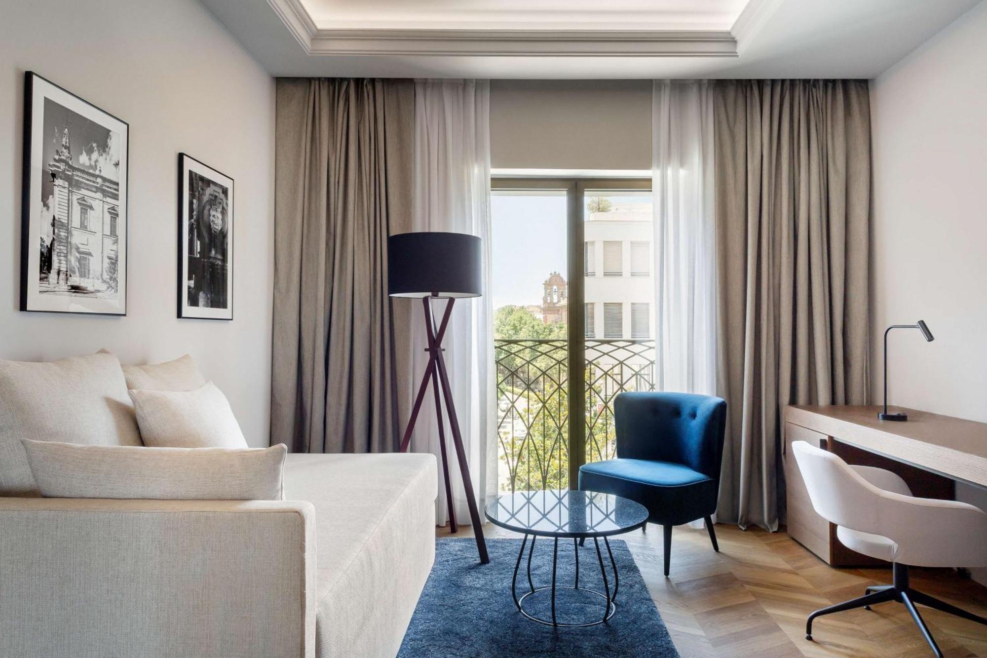 เรดิสัน คอลเลคชั่น โฮเทล มักดาเลนา พลาซา เซบียา Hotel เซบีญา ภายนอก รูปภาพ A room at the hotel
