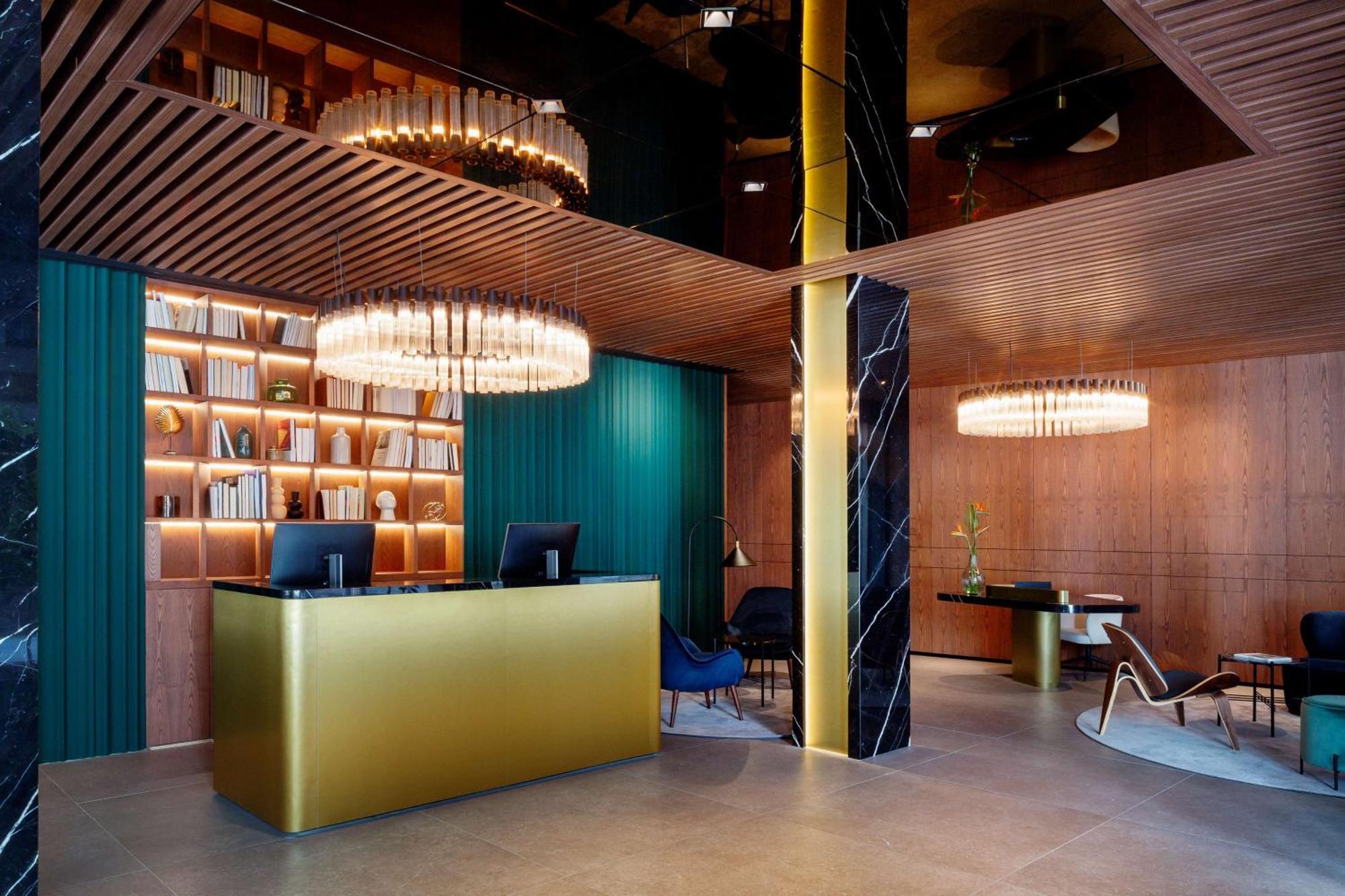 เรดิสัน คอลเลคชั่น โฮเทล มักดาเลนา พลาซา เซบียา Hotel เซบีญา ภายนอก รูปภาพ The Library